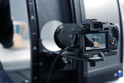 Camera capturing a product inside an Orbitvu studio