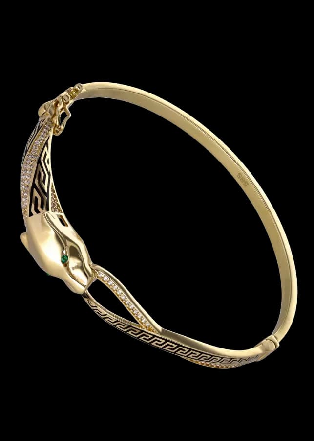 Gold panther head bangle bracelet with green eyes diamonds and enamel