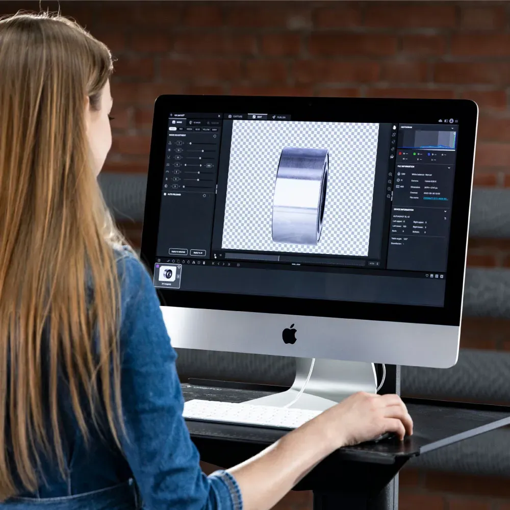 Woman editing product photo on Mac