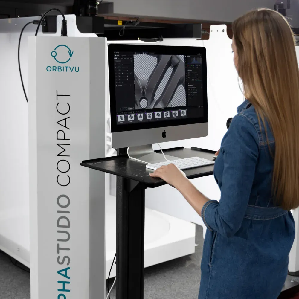 Woman using Orbitvu Alphastudio Compact