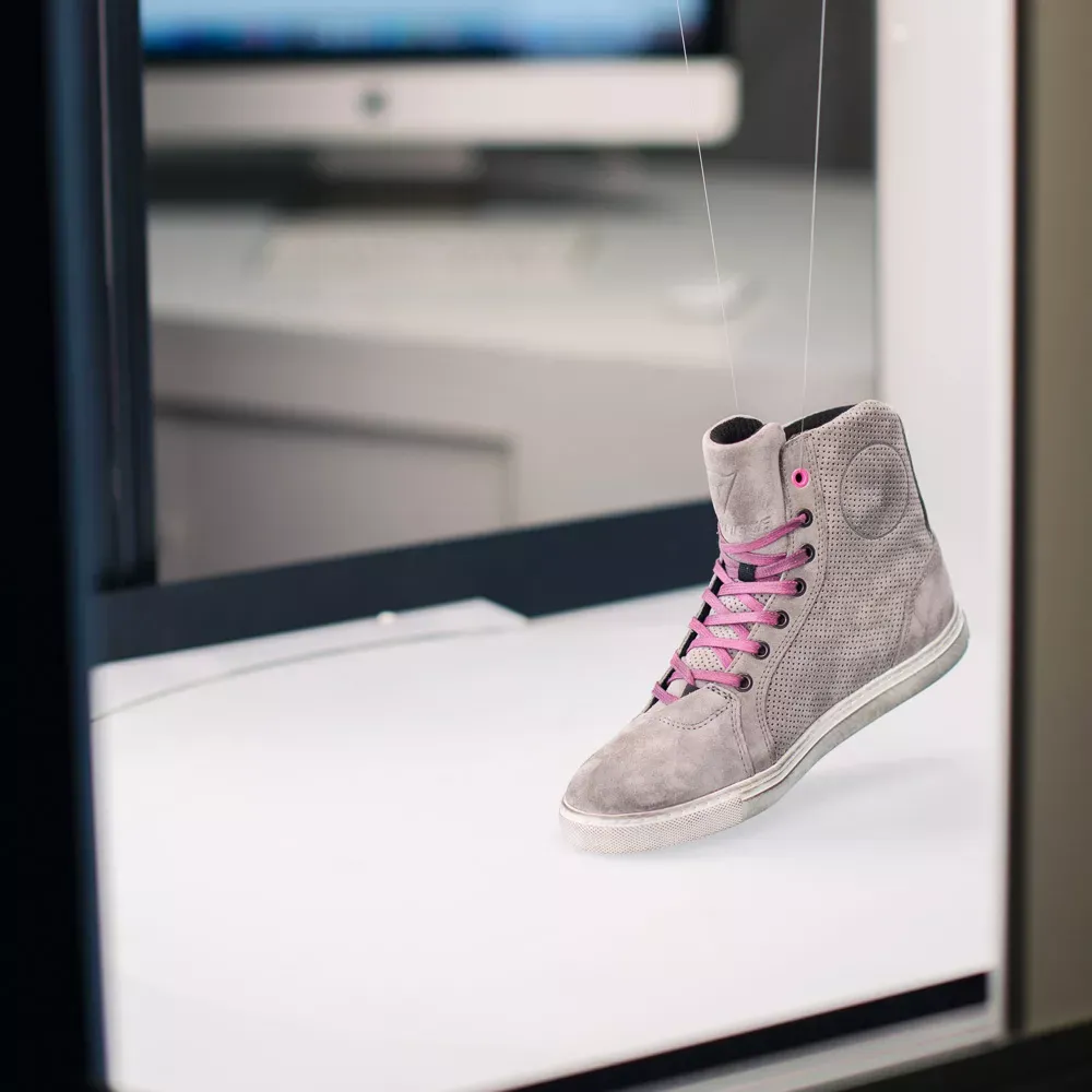 Grey suede high-top sneaker with pink laces product shot